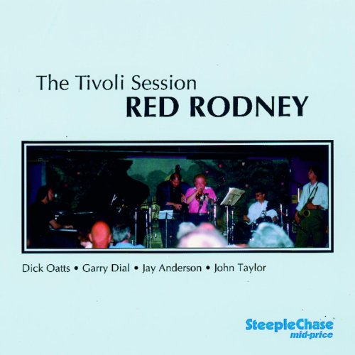"Album cover with a photo of a jazz band performing on stage."