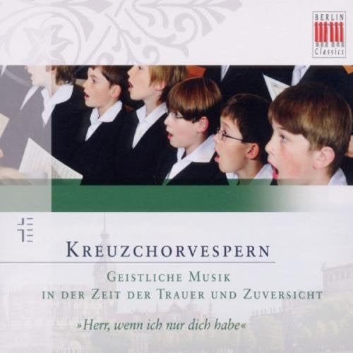 "CD cover with boys in choir robes and sheet music, German text."