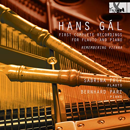 A CD cover featuring a close-up of a flute on a piano.