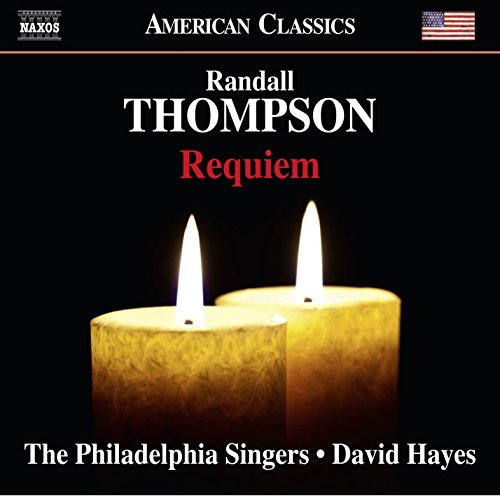 "CD cover with two lit candles on a black background, featuring text."