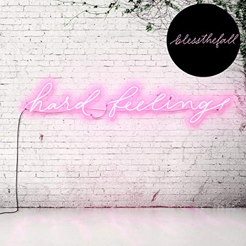 "Album cover with neon 'hard feelings' sign on a white brick wall."