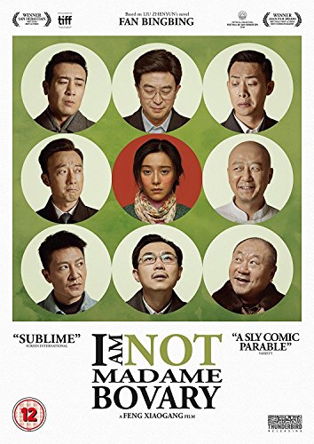 Movie poster: woman centered by nine men in circular frames.