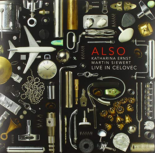Vinyl record cover with collage of small metal objects and text “ALSO”.