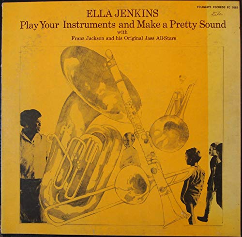 Yellow vinyl record cover featuring musicians and large brass instruments.
