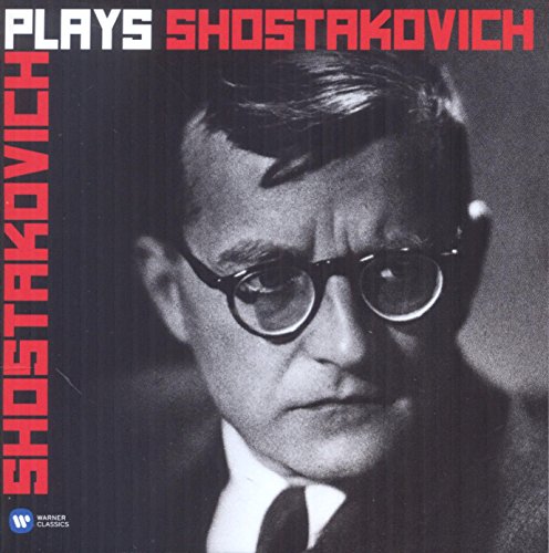 Black and white portrait of composer Dmitri Shostakovich in glasses.