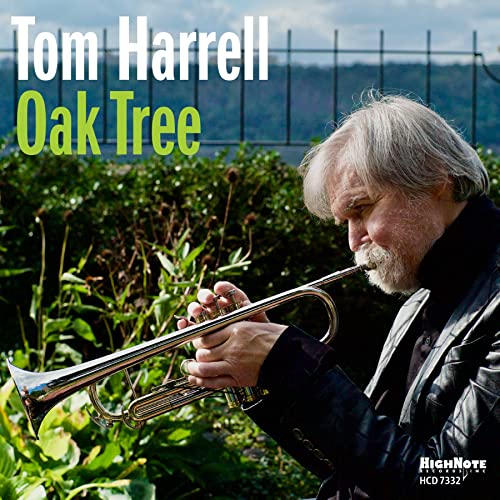 Tom Harrell plays trumpet outdoors, album cover for "Oak Tree.