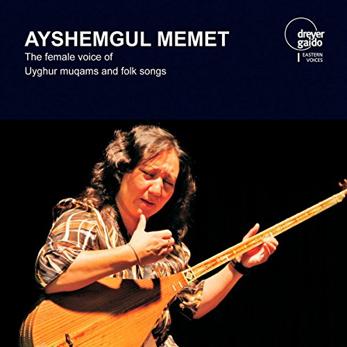 "CD cover featuring a woman playing a stringed instrument against a black background."