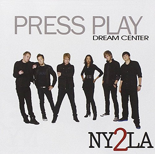 CD cover for “Press Play” by Ny2la, featuring six people in black.