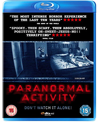 Paranormal Activity" Blu-ray cover with a shadowy bedroom scene and red title.