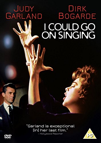 Judy Garland sings with arms raised while Dirk Bogarde watches on the DVD cover.