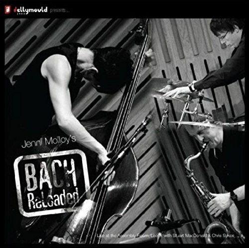 Black and white image of three musicians playing instruments together in a studio.