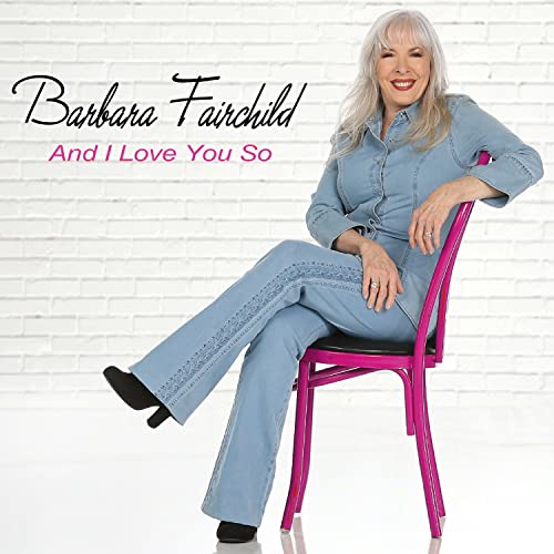 Barbara Fairchild album cover, woman in denim suit sitting on pink chair.
