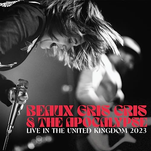 Black and white CD cover featuring a singer with a microphone.