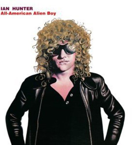 Album cover featuring a man with curly hair, wearing sunglasses and a leather jacket.