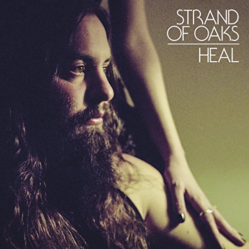 Album cover for Strand Of Oaks’ “Heal” featuring a bearded man in profile.