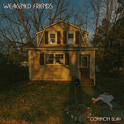 Album cover: a small house with a person lying in the grass.