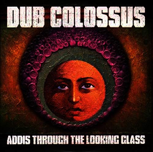 CD cover for Dub Colossus’ “Addis Through The Looking Glass” with a face.