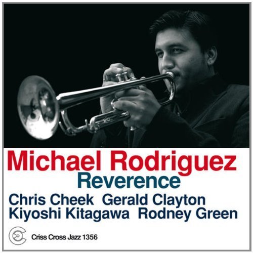 Jazz album cover featuring a man playing trumpet, with artist and title text.