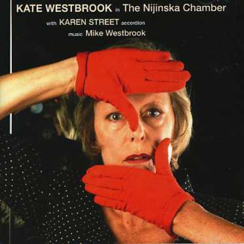 "Album cover featuring a woman with red gloves framing her face."