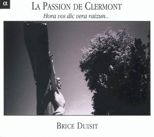 "Album cover with a black-and-white image of a statue against a tree."