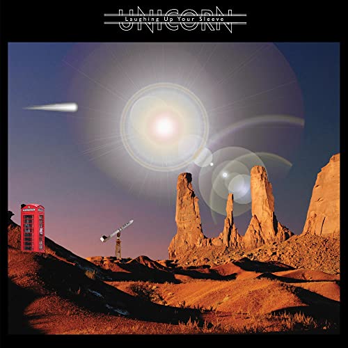 Album cover: desert landscape with a red phone booth and sunburst.