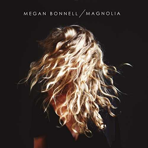 CD cover featuring a close-up of a person with long, curly blonde hair.