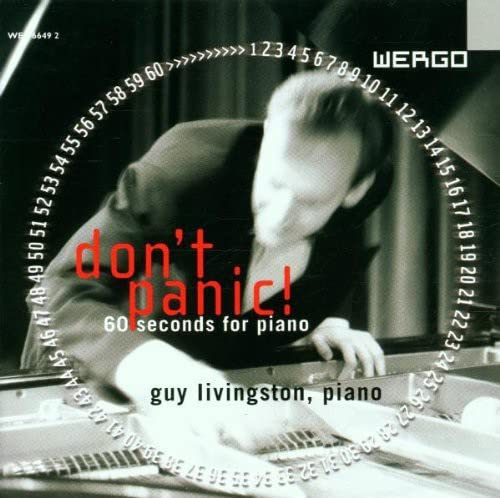 CD cover: pianist at a grand piano with text "don't panic!".