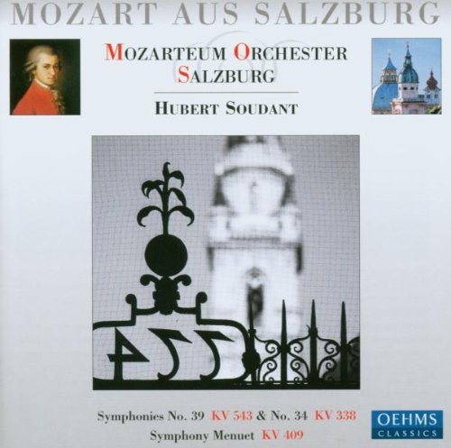 A CD cover featuring Mozart portrait, building image, and ornate fence design.