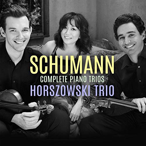 Black and white image of three musicians with text overlay, Horszowski Trio album cover.