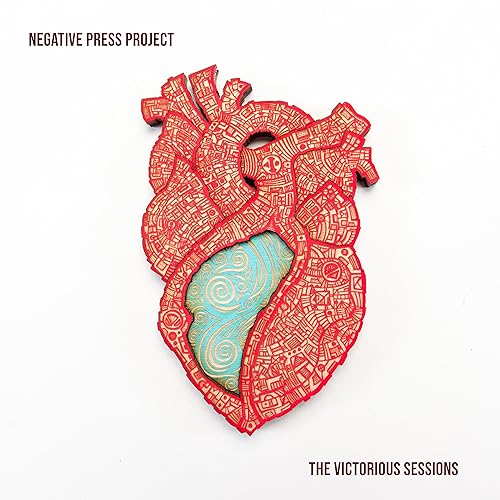 CD cover: detailed red anatomical heart with teal swirling center.