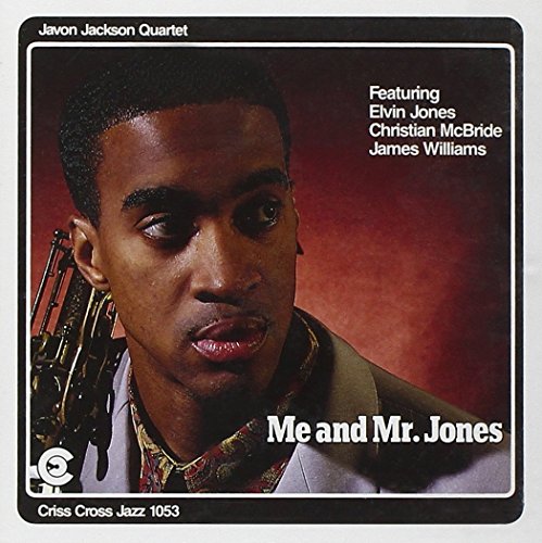 "Jazz album cover featuring a man holding a trumpet against a red background."