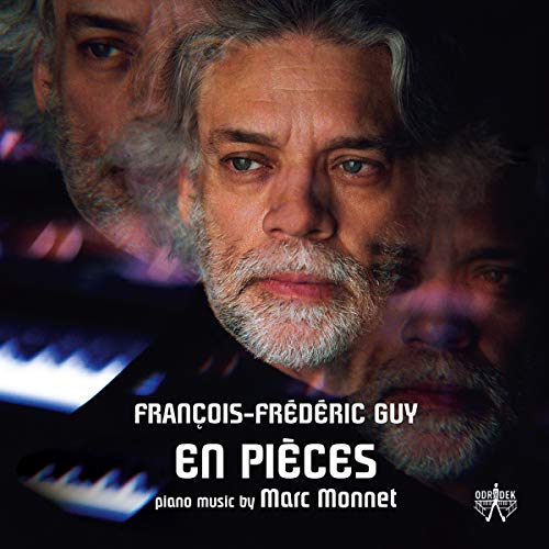 "Album cover featuring a man's face with multiple exposures and piano keys."