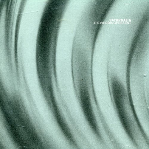 Grey album cover with wavy pattern, text "Saturnalia The Wedding Present" in top-right corner.