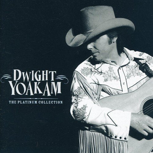 "Dwight Yoakam album cover featuring a man in a cowboy hat playing guitar."