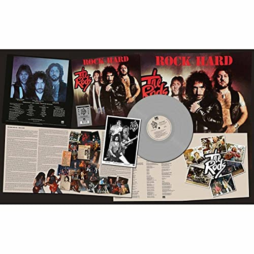 Silver vinyl record with album cover featuring a 1980s rock band.