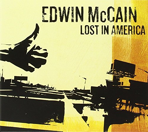 "Edwin McCain's 'Lost In America' CD cover, featuring a silhouette of a hitchhiking hand."