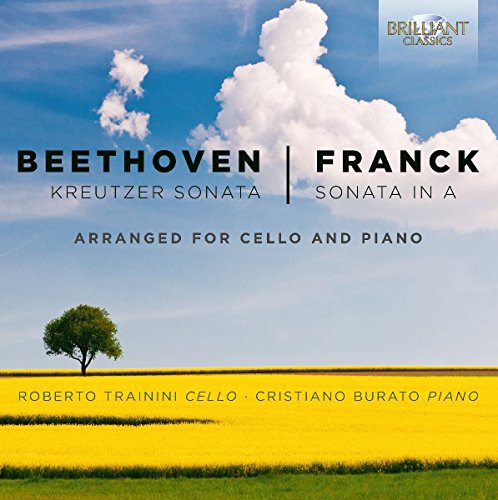 A CD cover with a field and tree under a blue sky.