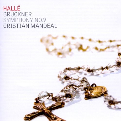 A rosary with a gold cross on a white background, with text in the corner.