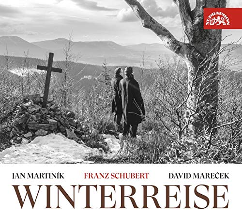 "Album cover with black-and-white image of two men walking past a cross."