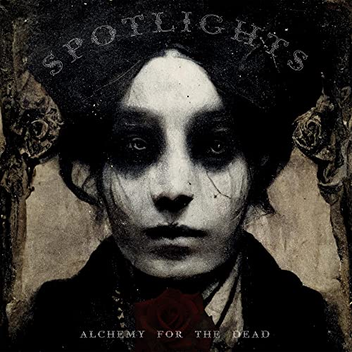 CD cover: distressed portrait of a pale woman with dark eyes.
