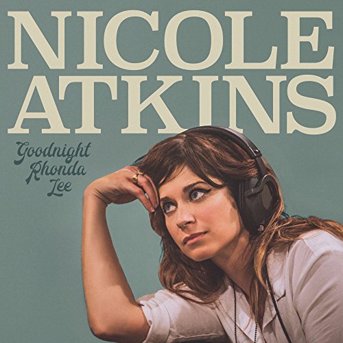 CD cover for Nicole Atkins' "Goodnight Rhonda Lee" featuring a woman with headphones.