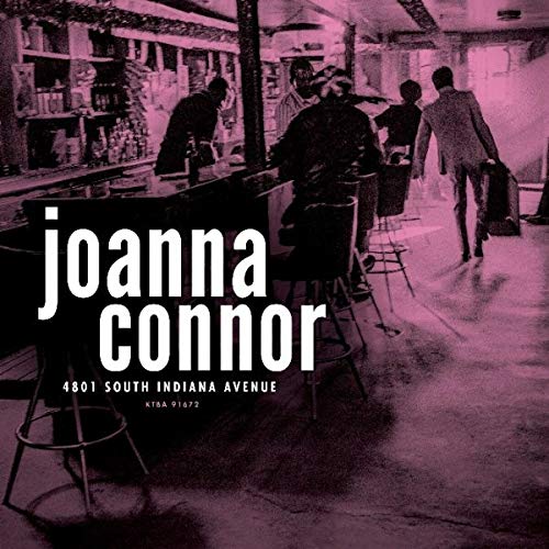 "Album cover with a purple-tinted bar scene and white text."