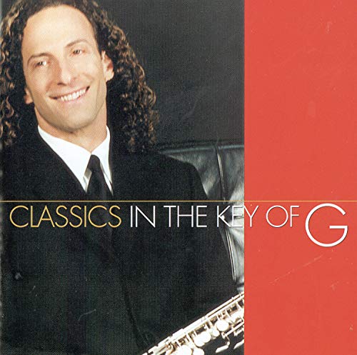 Kenny G album cover, portrait of musician with saxophone and red background.