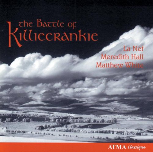 Album cover with black-and-white landscape, red title, and white text at the bottom.