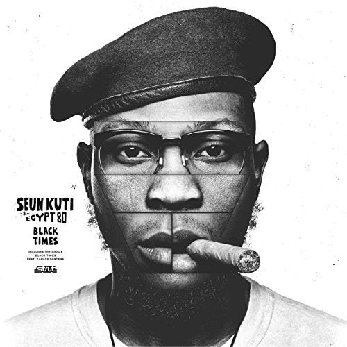 Black and white portrait of Seun Kuti with a beret and cigar.