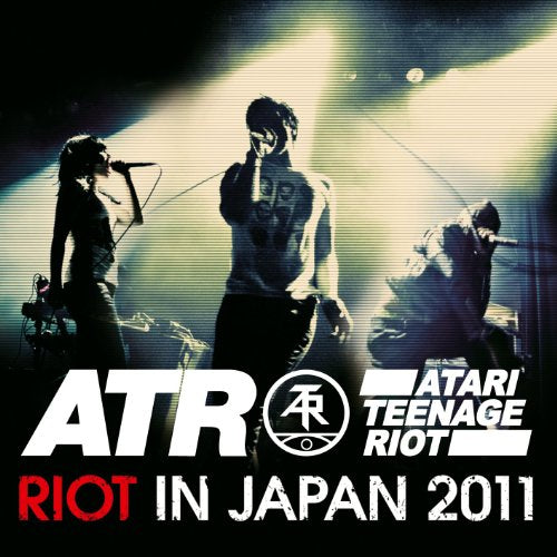 Atari Teenage Riot album cover: performers silhouetted onstage with bold text.