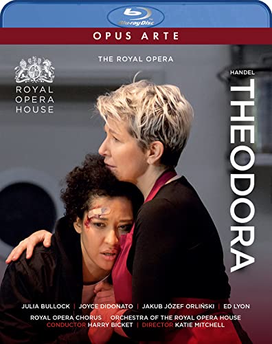 Blu-ray cover for opera "Theodora" featuring two distressed women embracing.