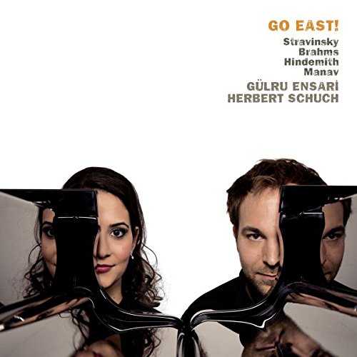 "CD cover with a man and woman holding violins, white background, composer names listed."