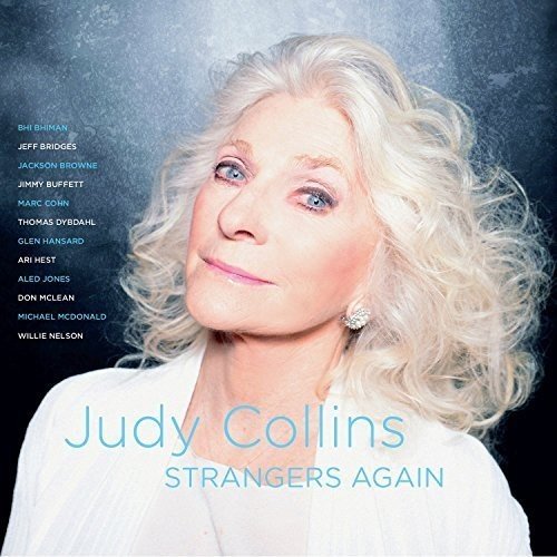 "Album cover featuring Judy Collins with curly blonde hair and a white top."
