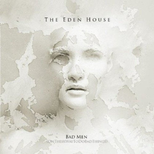 A CD cover featuring a face on peeling plaster with text "The Eden House".